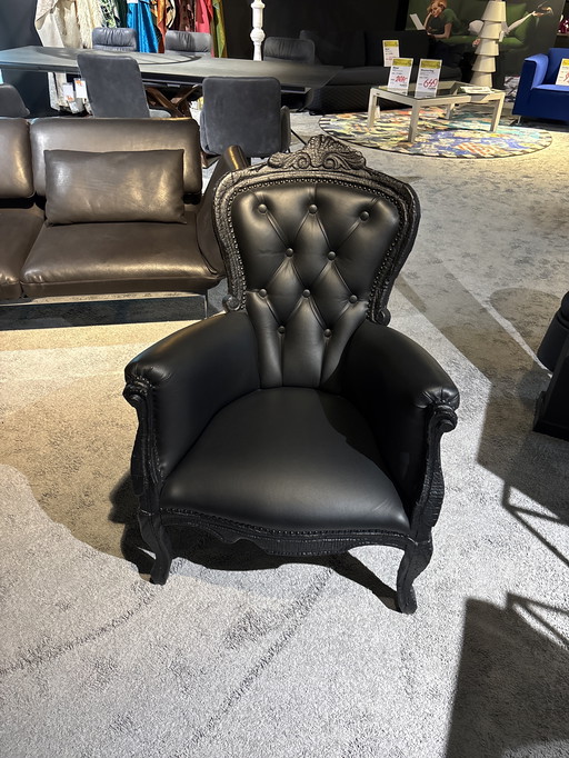 Moooi rookkleurige fauteuil