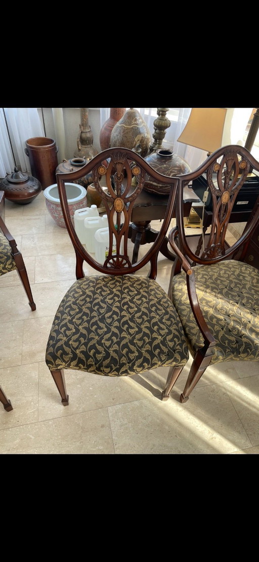 6 Höllenstühle Mahagoniholz