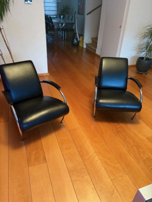 two Gelderland armchair chairs