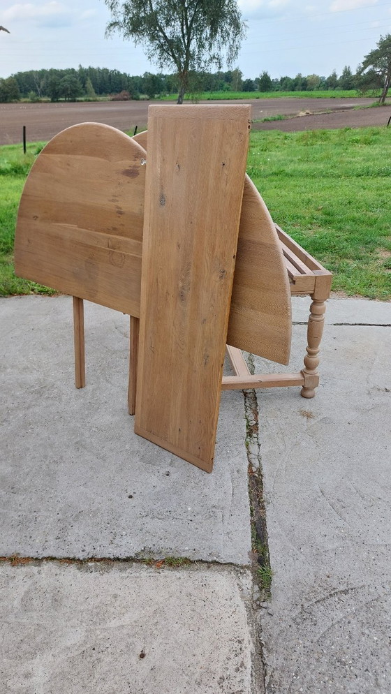 Image 1 of Large oval table in solid oak