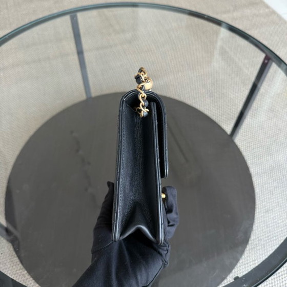 Image 1 of Sac Chanel Mini Flap Chic en agneau perlé noir, finitions dorées, série 28