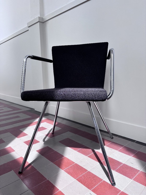 Image 1 of Silla de diseño Lande Hopper CE: asiento de tela texturizada negra y estructura cromada.