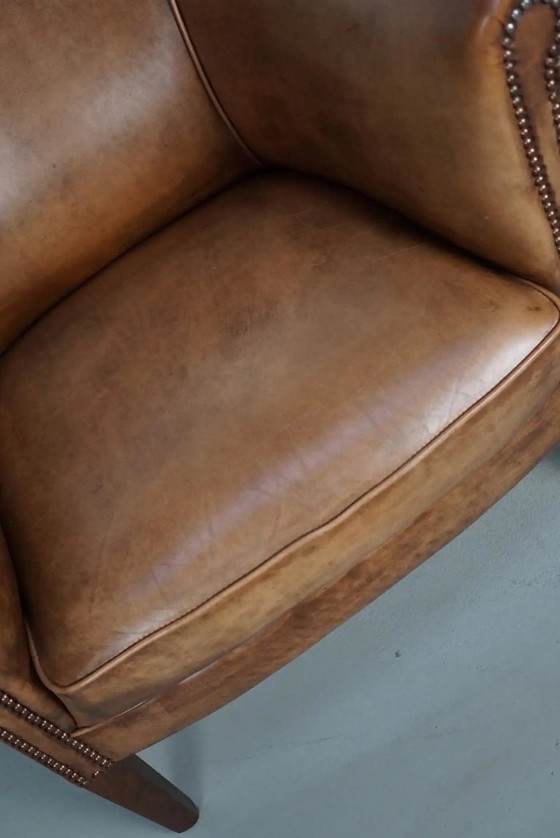 Image 1 of Vintage Nederlandse clubfauteuil van cognackleurig leer
