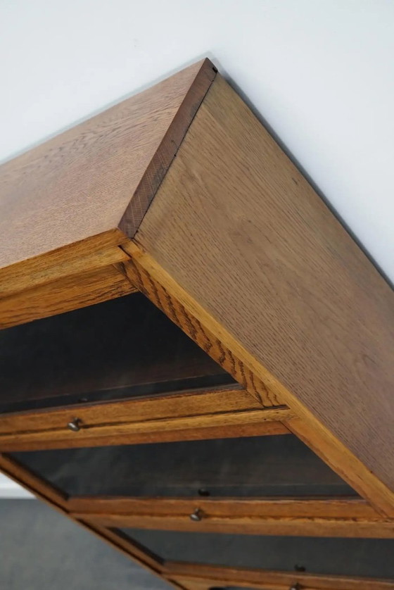 Image 1 of Duitse eiken boekenkast met schuifdeuren in de stijl van Globe Wernicke, ca. jaren 1930