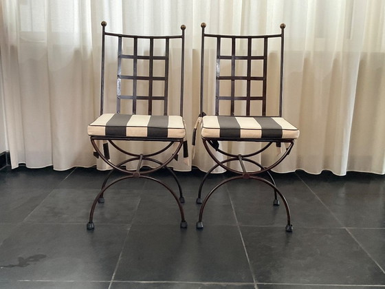 Image 1 of Wrought iron dining room table with 6 chairs made in Provence by local art smith (2005).