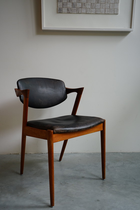 Image 1 of 6 Kai Kristiansen stoelen | Model 42 | Teak Leder patina