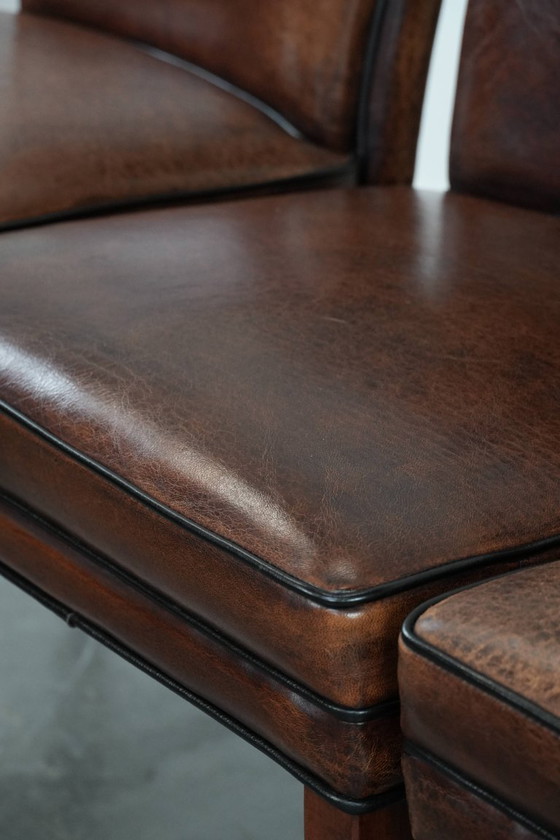 Image 1 of 4 chaises de salle à manger confortables en peau de mouton avec du caractère