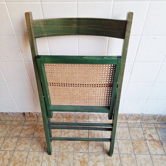 Image 1 of Sedia pieghevole vintage in legno con seduta in rattan