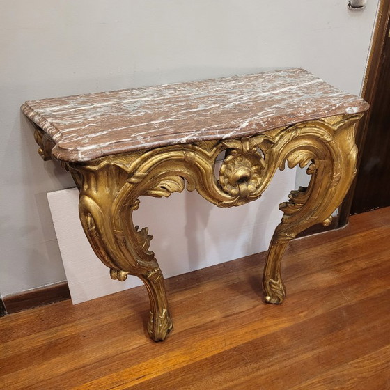 Image 1 of Consolle a muro, in legno intagliato e dorato, stile Luigi XV, XVIII secolo – Francia