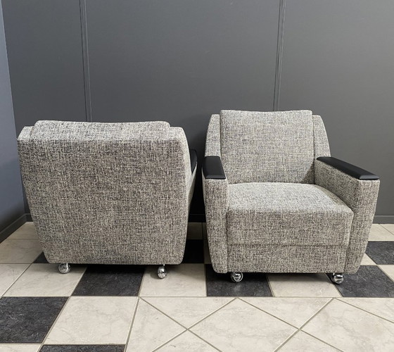 Image 1 of set of 2 grey relax chairs on castors 1970s