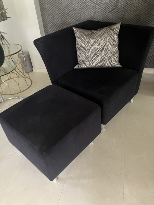 Fauteuil noir avec repose-pieds