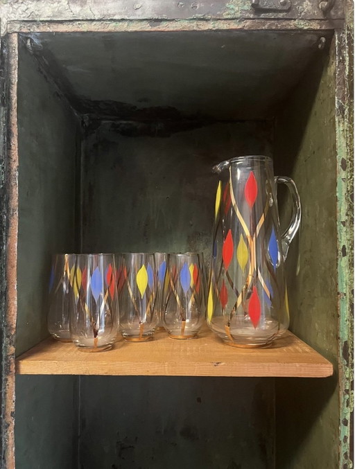 Hand-painted jug and 8 glasses from the 1950s
