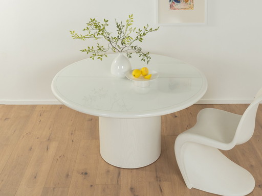 Postmodern extendable round Dining Table