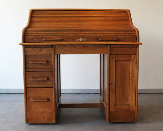 Image 1 of Amerikaans bureau van licht eikenhout, eind 19e eeuw.