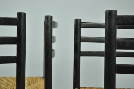 Image 1 of Mid-Central modern dining chairs with rush seats, 1960s