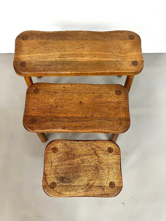 Image 1 of 3 solid Brutalist oak side tables, France, 1960s.