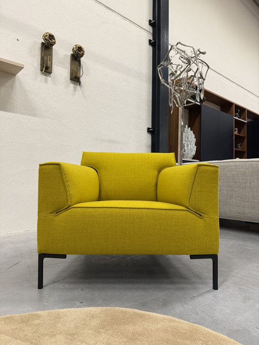 Design On Stock Bloq Armchair With Footstool Plough Wool Yellow