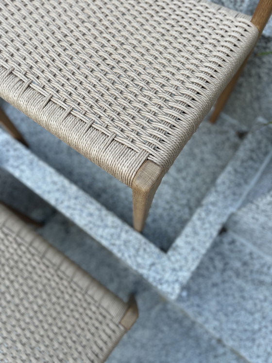 Image 1 of 4 eiken Niels Otto Moller eetkamerstoelen met papercord
