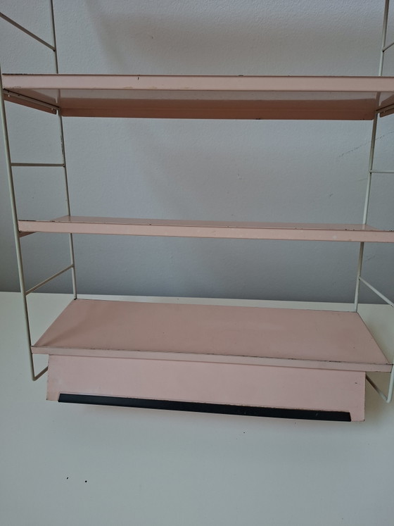 Image 1 of Raro estante de pared con la marca Tomado Holland