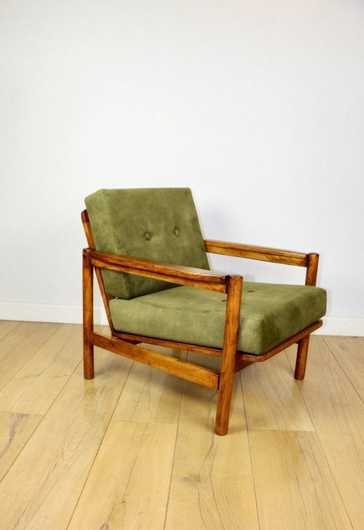 Wooden armchair designed by Z. Baczyk in a vintage style, upholstered in olive green velvet.