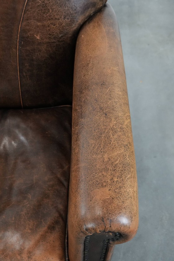 Image 1 of Fauteuil vintage en peau de mouton avec du caractère