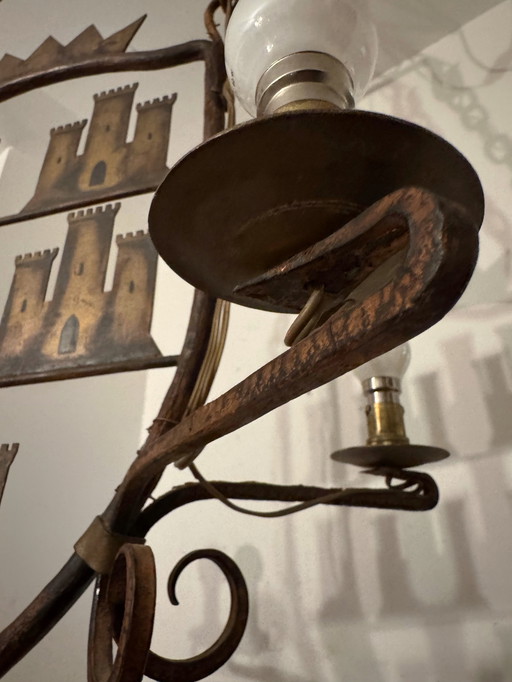 Medieval-style heraldic wrought-iron chandelier