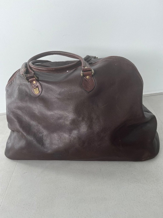 Image 1 of brown leather travel bag from Candy Corson leather atelier Amsterdam