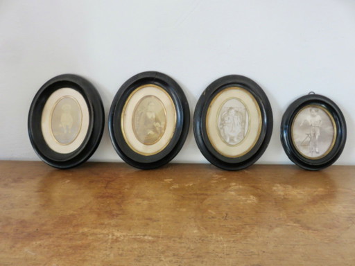 Série de 4 cadres Napoléon III, en bois noirci, 1870, France