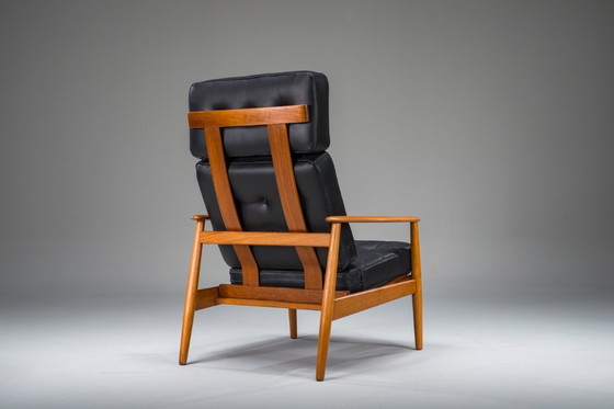Image 1 of Fauteuil met model FD 164 frame van Arne Vodders en model 118 armleuningen van Grete Jalks in teak en zwart leer, Denemarken, ja