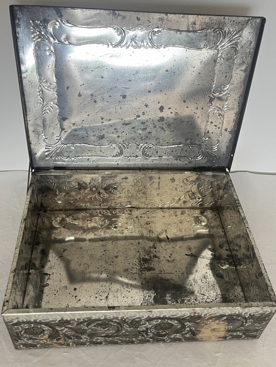 Image 1 of Pagani verslond een blikken doos