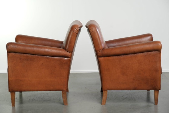 2x Fauteuils en cuir de mouton beaux et confortables avec de belles couleurs et un design intemporel (photo 4 of 14)