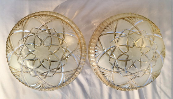 Image 1 of Een paar hoogwaardige vintage wand-/plafondlampen van loodkristal met stervormige slijping.