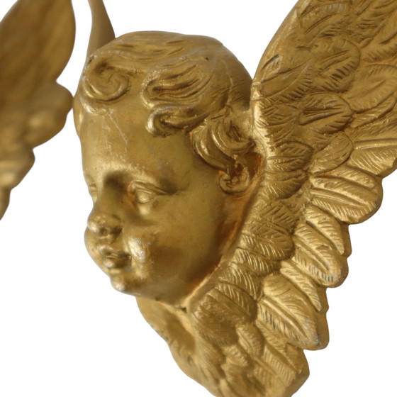 Image 1 of Teste d'angelo in metallo dorato
