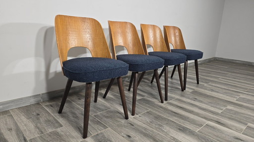 Dining Chairs by Oswald Haerdtl
