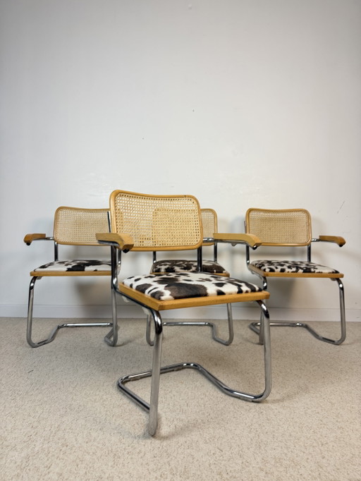 Suite de 4 fauteuils cannés chrome et bois années 70