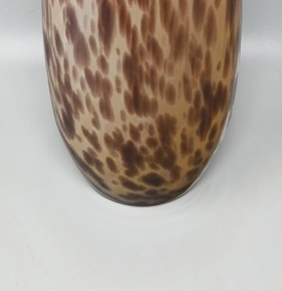Image 1 of https://madinteriorart.com/collections/vases/products/1970s-luxury-handcrafted-vase-in-murano-glass-by-maestro-del-vetro-made-in