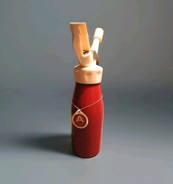 Image 1 of ISI Austria slagroomdispenser uit de jaren 70.