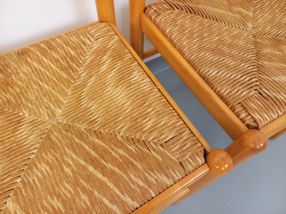 Image 1 of Suite van 4 Vintage Brutalistische stoelen in licht hout en stro uit de jaren 70 en 80