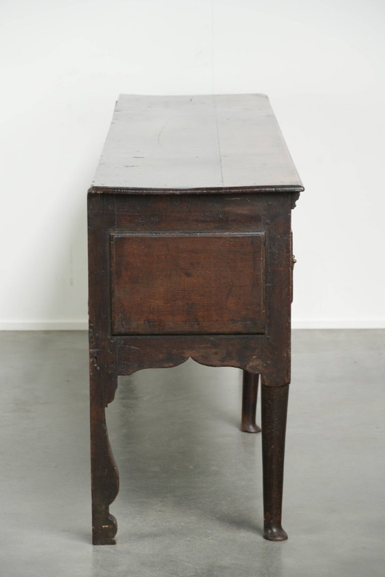 Image 1 of Large English antique oak sideboard/dresser with 3 working drawers from the early 18th century with a beautiful patina