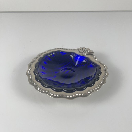 Trinket dish / Open butter dish in silver-colored metal with a seashell shape and blue glass insert, 1970