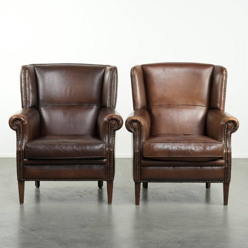 2x subtle English-style sheepskin wingback armchairs with beautiful colors