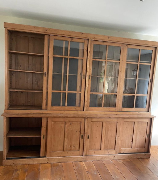 Antique cabinet with blown glass