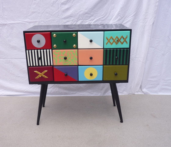 Image 1 of Minikast met 12 laden