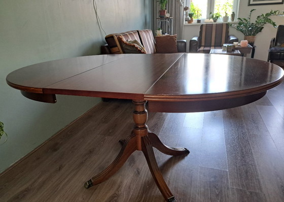 Image 1 of Mahogany dining table with brass lion legs