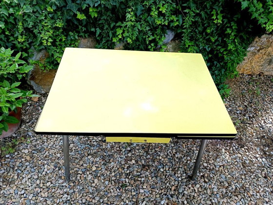 Image 1 of 1960s vintage lemon-yellow formica table