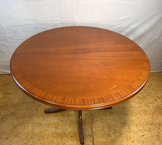 Image 1 of Mid-Century Retro Vintage Teak Extending Round Dining Table by Parker Knoll – 1970  Elegant | Space-Saving | Practical | Iconic 