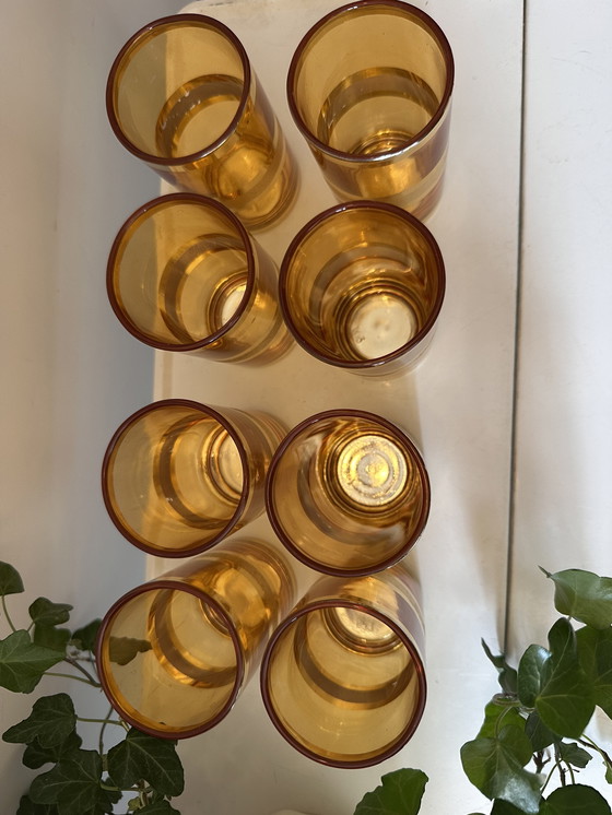 Image 1 of Set of 8 gold/amber colored glasses