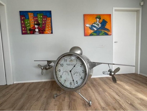 Image 1 of Groot vliegtuig met klok