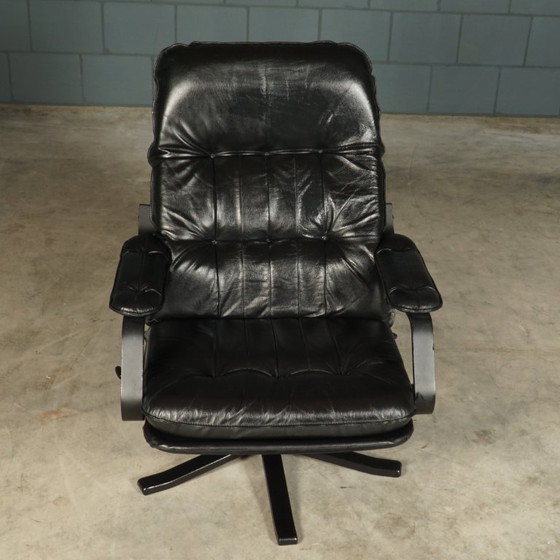 Image 1 of Vintage Unico draaifauteuil met hocker – jaren 70