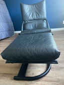 Rolf Benz BMP relaxfauteuil met hocker zwart leer